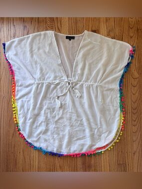 Poncho-style swimsuit cover-up detailed with vibrant rainbow pom-pom trim / M